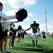 Father Gabriel Richard senior running back Ashton Hundley is congratulated by cheerleaders after defeating Macomb Lutheran North on Saturday. FGR won 24-10. Hundley rushed for 218 yards and three touchdowns. Daniel Brenner I AnnArbor.com